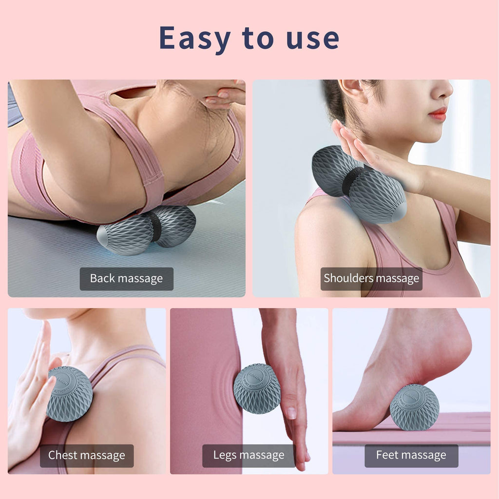 Grey PROIRON massage ball used against a wall and on the floor