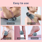 Grey PROIRON massage ball used against a wall and on the floor