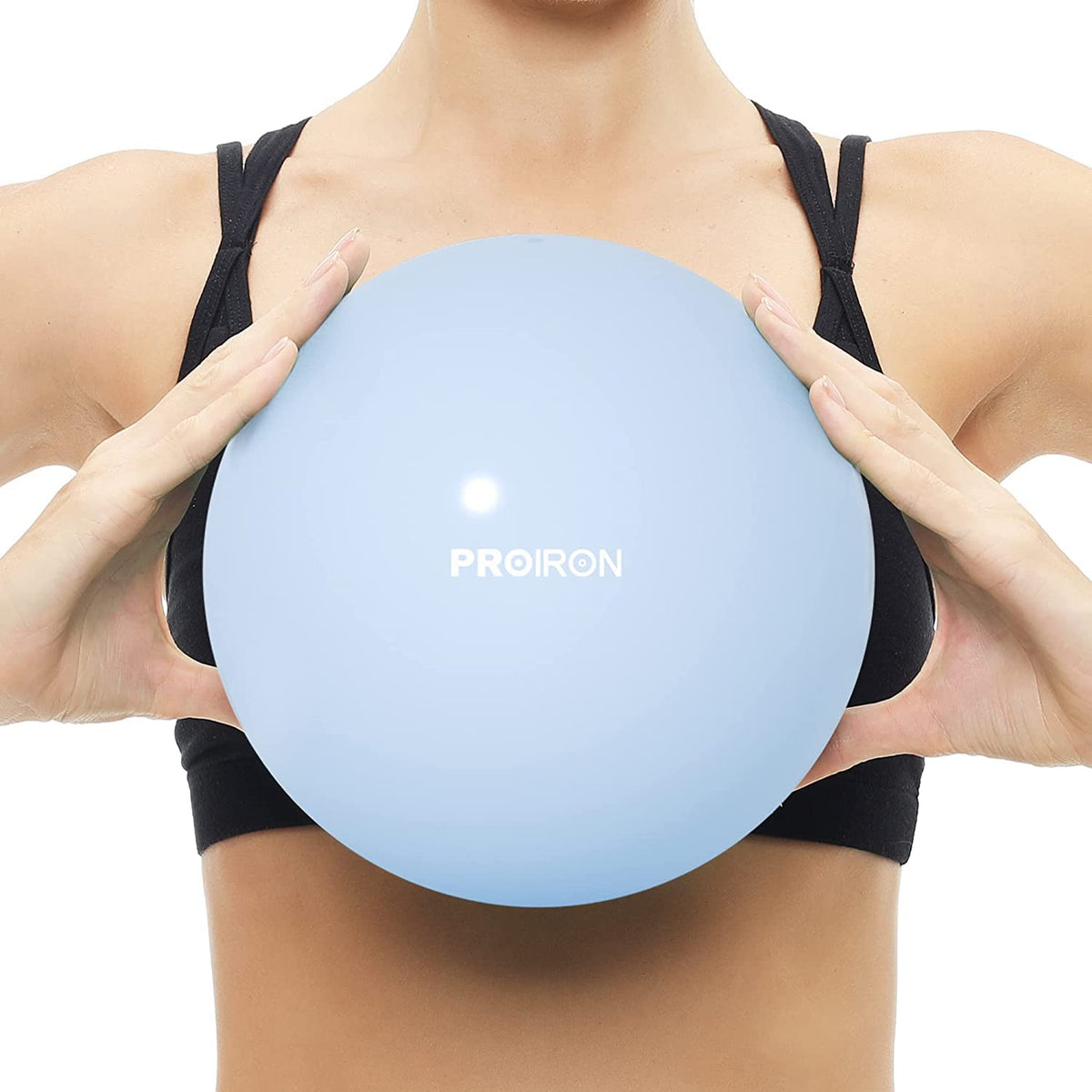 PROIRON 25cm blue Pilates ball – held at chest height