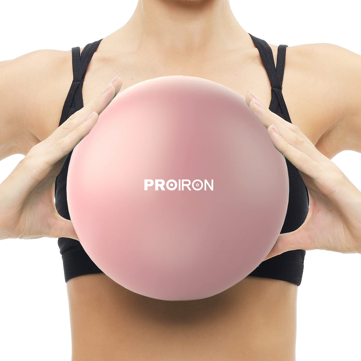 PROIRON 25cm pink Pilates ball – held at chest height