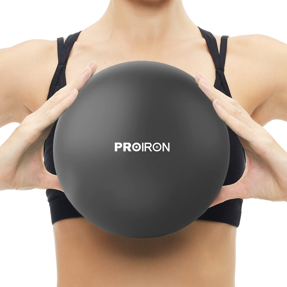 PROIRON 25cm black Pilates ball – held at chest height