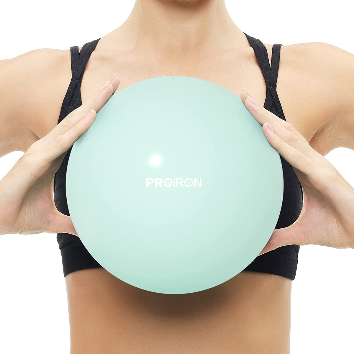PROIRON 25cm green Pilates ball – held at chest height