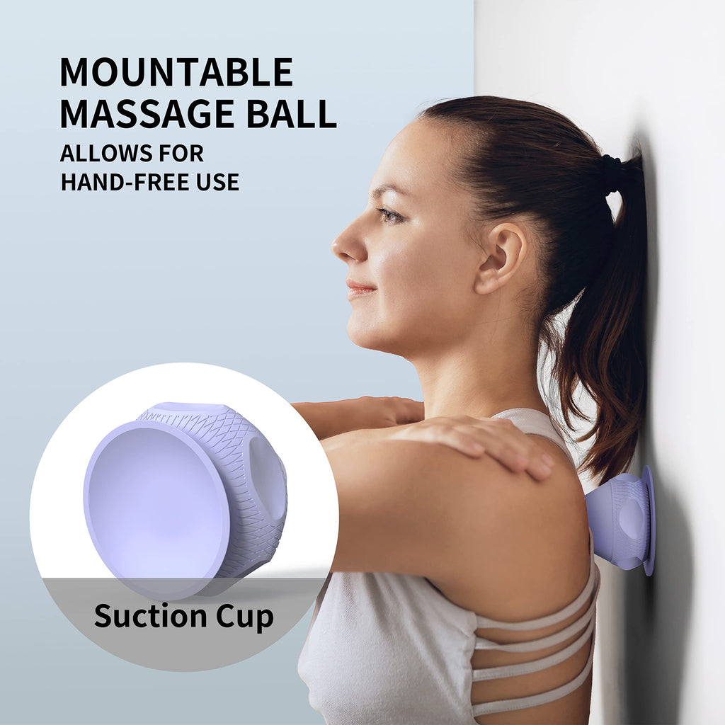 Purple PROIRON suction cup massage ball positioned against a smooth wall for shoulder self-massage