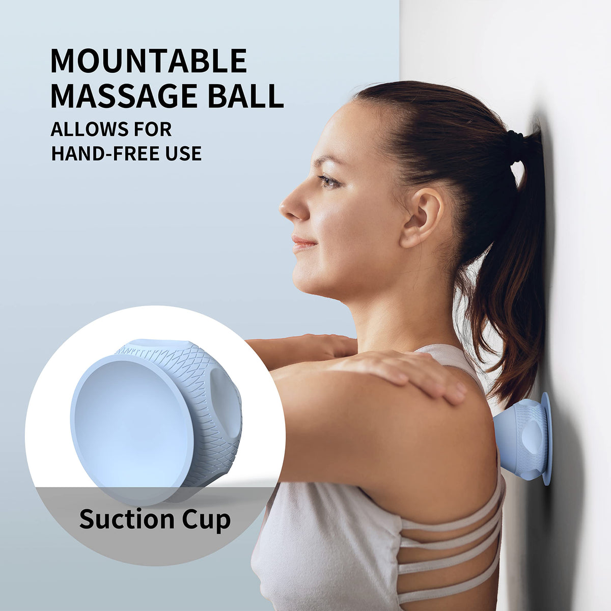 Blue PROIRON suction cup massage ball positioned against a smooth wall for shoulder self-massage